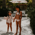 costume-intero-bambina-con-mani-lunghe-fiori-cuori-3